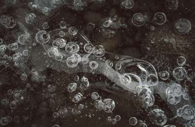 Air Marbles In Ice by Erik